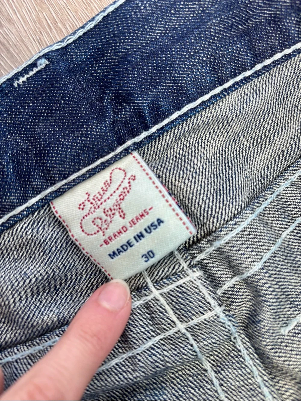 Vintage made in USA True Religion men’s dark blue bootcut jeans, leather accent